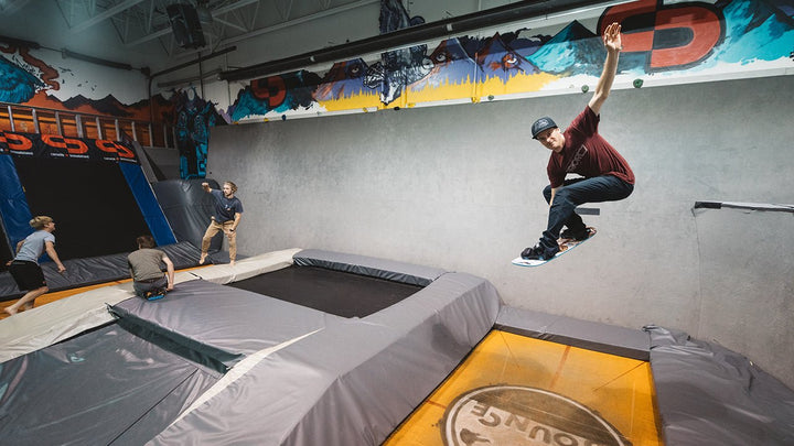 Basic Grabs On A Tramp Board - Snowboard Addiction
