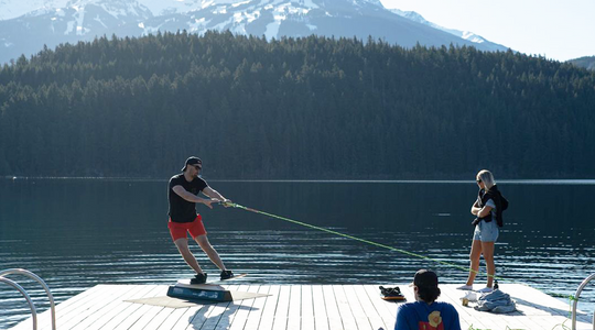 Tramp Board Wide Training By The Lake With A Wake Board Rope