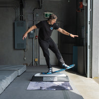 Guy jibbing on the snowboard addiction jib board essentials. Doing a tail press